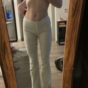 Beautiful vintage boot cut pin stripe pants. Unique V shape in back